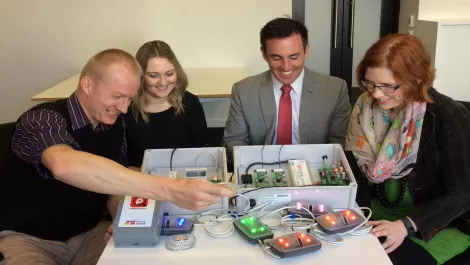 It makes sense company xs marcel van de steeg left demonstrates software features to parking senses stacey king jake bezzant and company xs claire sherrington right